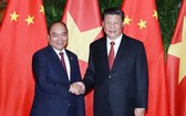 政府總理阮春福與中國國家主席習近平在會見中討論多項問題。(圖源:越通社)