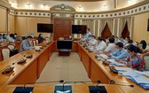 圖為市人委會日前召開的一項會議,與會者全佩戴口罩。(圖源:梅香)