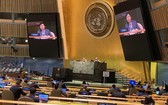 鄧廷貴大使在會議上介紹決議內容。(圖源:越通社)