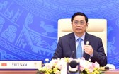 政府總理范明政出席第三十八屆東盟峰會並發表重要講話。(圖源:VGP)
