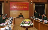  “關於國防、軍事的胡志明思想與在新時期運用建設越南國防戰略、軍事戰略”國家級題材的評價和驗收會議現場一瞥。（圖源：明慶）