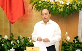 阮春福總理在政府3月份例會上發表講話。（圖源：光孝）