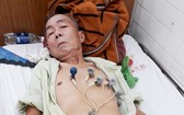 記者到醫院探望鄧鴻超時，他正在輸液和使用儀器監測心臟。