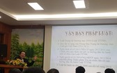 市商業仲裁委員會主席阮文厚律師在研討會上發表演講。（圖源：玉盛）