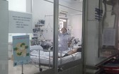 某一甲型H1N1流感患者在大水鑊醫院隔離病房接受治療中。（圖源：越通社）