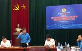 越南勞動總聯團常務副主席陳清海（左二）在研討會上發言。（圖源：明珠）