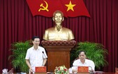 中央宣教部長武文賞（左）在會議上發言。（圖源：越通社）