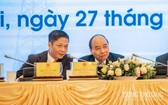 政府總理阮春福（右）與工商部長陳俊英出席會議。（圖源：工商部）