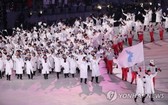 韓朝代表團共同入場2018年平昌冬奧會開幕式。（圖源：韓聯社）