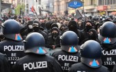 德國柏林5月1日的遊行活動中約有240人被拘留，30多名警員受傷。（圖源：AFP）