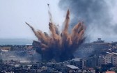 圖為以色列13日對加沙地帶實施空襲。 （圖源：紐約時報）