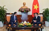 政府副總理、外交部長范平明接見摩洛哥駐越南特命全權大使法爾漢。（圖片來源：VGP）