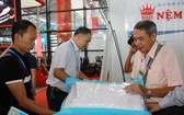 越南華人企業萬成乳膠床墊公司參加第十五屆中國-東盟博覽會。