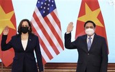 越南政府總理范明政接見美國副總統哈里斯。