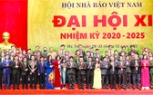 大會選出第十一屆越南新聞工作者協會執委會的52位同志。黎國明再次當選2020-2025年任期越南新聞工作者協會主席。