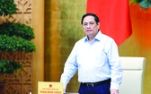 政府總理范明政在會議上發表講話。