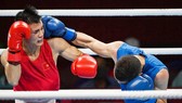 Võ sĩ Nguyễn Văn Đương (trái) sẽ được đưa sang tập huấn tại Cuba.