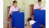 Cô giáo chấm bài xong rồi "thả" xuống nền gạch, học sinh chạy lên nhặt đem về. Ảnh cắt từ clip