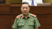 Bộ trưởng Tô Lâm trả lời chất vấn. Ảnh: VGP