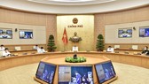 Thủ tướng Phạm Minh Chính triệu tập cuộc họp trực tuyến khẩn cấp với 2 tỉnh Bắc Giang, Bắc Ninh. Ảnh: VIẾT CHUNG