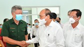 Chủ tịch nước Nguyễn Xuân Phúc tiếp xúc cử tri huyện Hóc Môn. Ảnh: VIỆT DŨNG