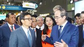Deputy Prime Minister Vu Duc Dam (Left) and Party Chief Nguyen Thien Nhan ( Right) at the event (PHoto: SGGP)
