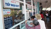 HCMC spends US$1 million buying health insurance cards for poor households