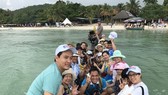 Family-friendly group tours warm up tourism market in Vietnam (Photo: SGGP)