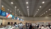 Passengers check in at the airport of Moscow