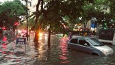 Tropical cyclone spreading from China to Northern Vietnam triggers downpours