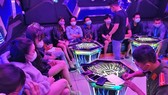 Two karaoke parlors fined, revoked business licenses for breaking Covid-19 rules