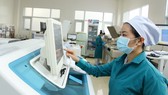 Phòng xét nghiệm tìm Covid-19 tại Bệnh viện 7A. Ảnh: HOÀNG HÙNG
