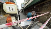 Khu ẩm thực đường Hồ Thị Kỷ được khoanh vùng, khử khuẩn. Ảnh: HOÀNG HÙNG