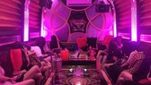 52 waitresses in pornographic dress serving foreigners. (Photo: Chí Thạch)