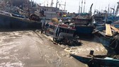 Gần 100 tàu thuyền của ngư dân thị xã La Gi bị chìm, hư hỏng do trận lũ quét.