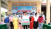 Công ty TNHH MTV Xổ số kiến thiết tỉnh Đồng Tháp trao học bổng “Thắp sáng ước mơ” tại xã Hòa An, thành phố Cao Lãnh