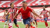 Luis Suarez tỏa sáng vào thời khắc hệ trọng nhất của Atletico Madrid. Ảnh: Getty Images