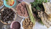 Hai anh em ruột tử vong sau bữa cơm trưa với rượu và thịt chó