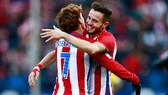 Barca muốn chiêu mộ Saul Niguez (phải) và Griezmann. Ảnh: Getty Images