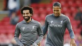 Trung vệ Virgil Van Dijk (phải) và Mohamed Salah trên tuyến đầu đang làm nên sức mạnh của Liverpool. Ảnh: Getty Images