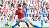 Mohamed Salah (trái) ghi bàn thắng duy nhất của trận đấu. Ảnh: Getty Images