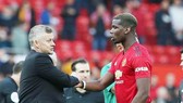 HLV Ole Gunnar Solskjaer nhận được cam kết từ Paul Pogba. Ảnh: Getty Images