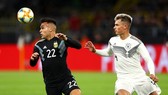 Argentina (trái) với đội hình trẻ trung ngược dòng thủ hòa 2-2 trước chủ nhà tuyển Đức. Ảnh: Getty Images