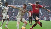 Liverpool (trái) được đánh giá quá cao