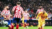 Lionel Messi với khoảnh khắc tỏa sáng giúp Barcelona đánh bại chủ nhà Atletico Madrid. Ảnh: Getty Images