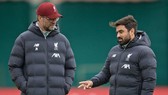 HLV Jurgen Klopp mong chờ thời điểm trở lại của Premier League. Ảnh: Getty Images