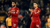 Liverpool mất 2 trụ trột phòng ngự Trent Alexander-Arnold (phải) và Joe Gomez trong vòng vài ngày. Ảnh: Getty Images