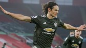 Edinson Cavani ăn mừng trong trận đấu khiến anh gặp rắc rối. Ảnh: Getty Images