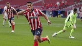 Luis Suarez đã không thể có màn ăn mừng trọn vẹn. Ảnh: Getty Images