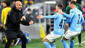 HLV Pep Guardiola dường như đang được tiếp thêm niềm tin từ thành công mùa này. Ảnh: Getty Images